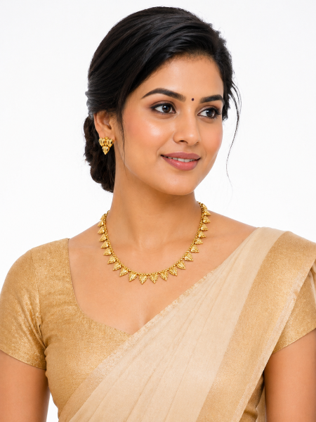 Gold plated leaf design necklace with earring
