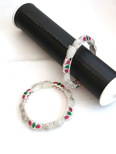 silver Bangle with pink and green stones
