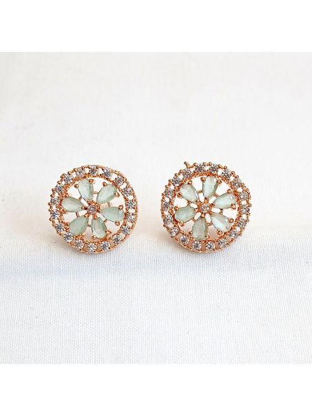 Green stone earring with small white stone