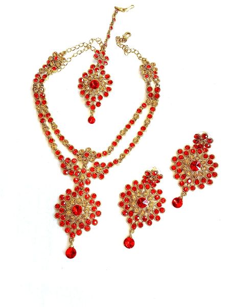 Neckalace and earring with red colour stones