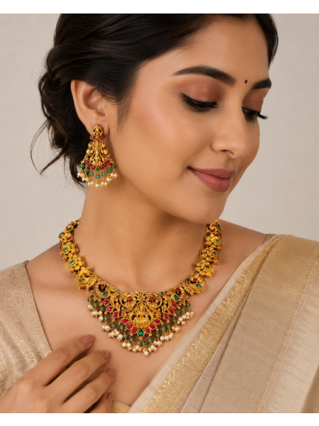 Antique gold temple necklace with ruby & emerald-tone stones, pearl drops, and matching earrings