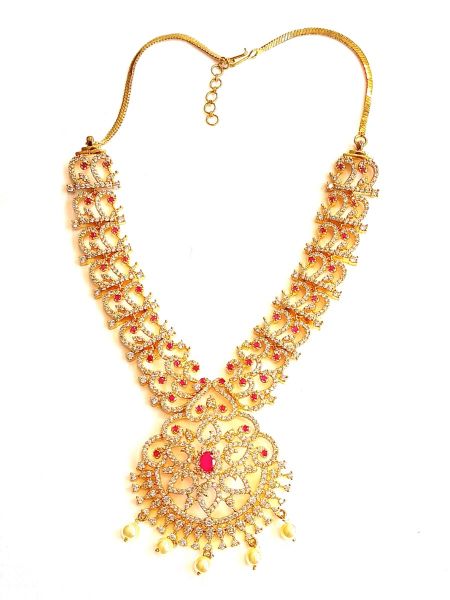 Designer Neckalace and earring with white stones and pearls