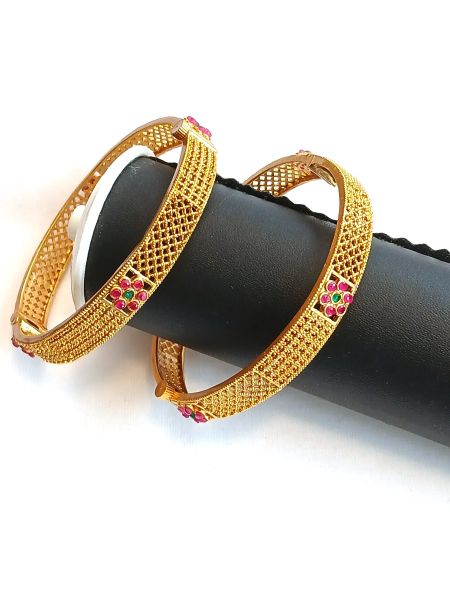 Bangle with pink and green stones