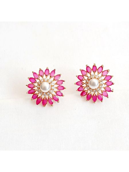Pinkish stone earring with tiny white stone with pearl