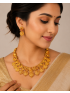 –Antique gold coin necklace with traditional temple detailing and matching earrings