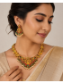 Antique gold temple necklace with ruby & emerald-tone stones, pearl drops, and matching earrings