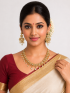 Neckalace and earring with white colour stones