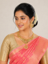 Net design necklace with pendent and pink stone