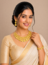 Gold plated flower steps design necklace set