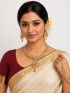 Neckalace with earrings with gold color stones