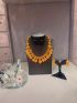 –Antique gold coin necklace with traditional temple detailing and matching earrings