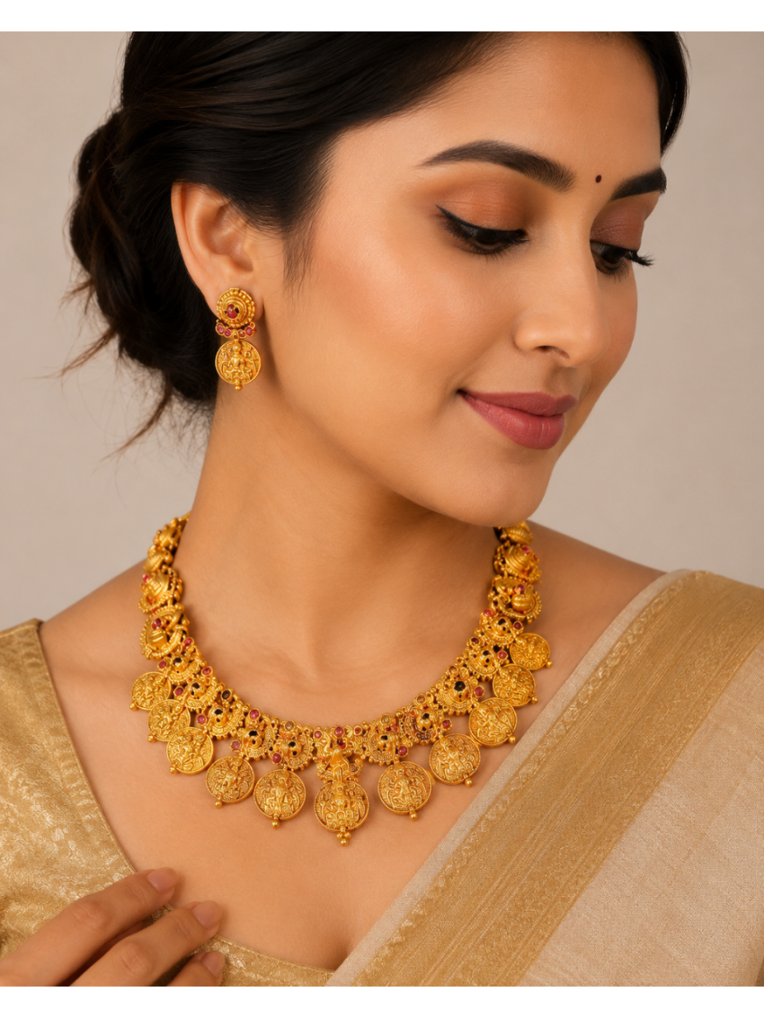 –Antique gold coin necklace with traditional temple detailing and matching earrings