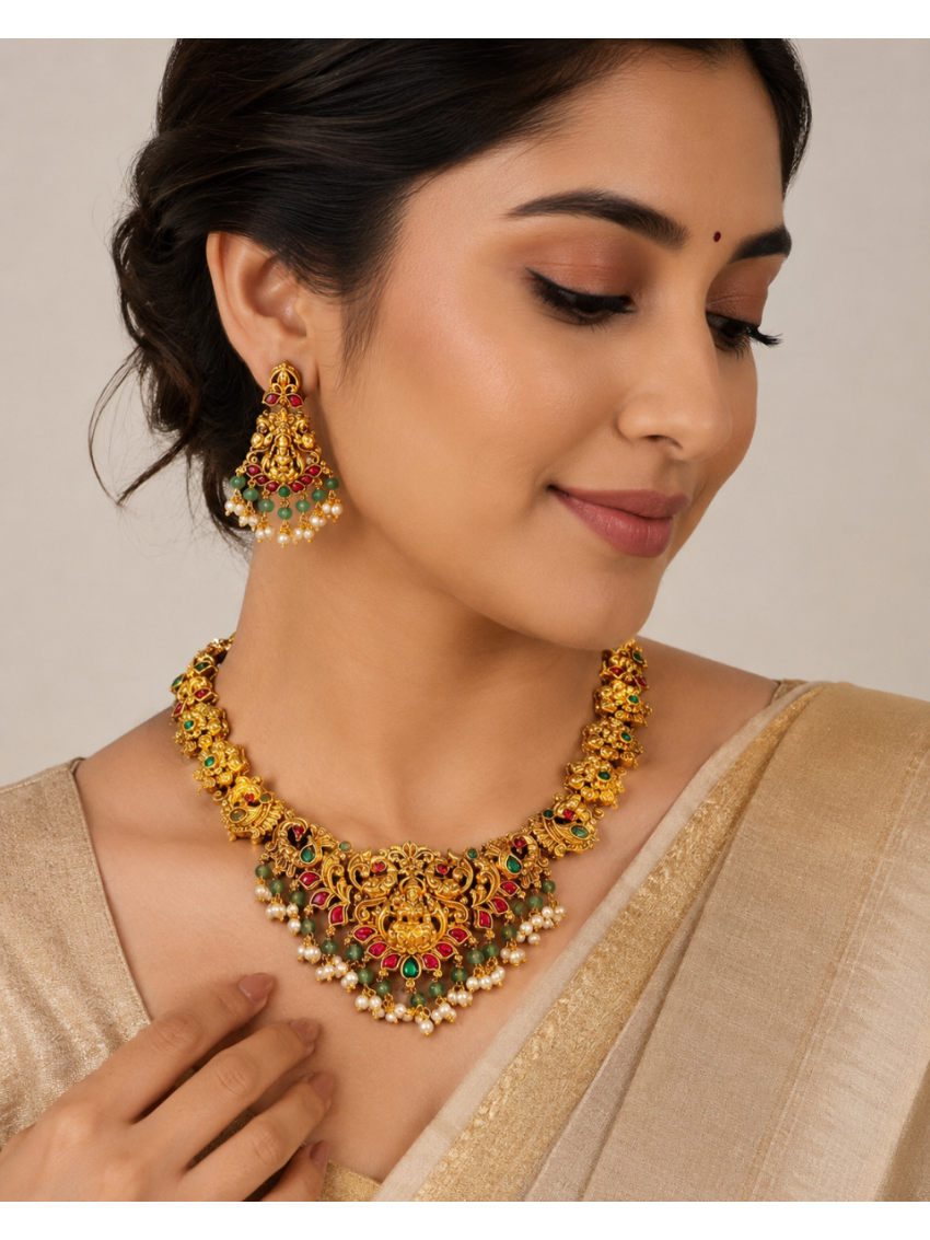 Antique gold temple necklace with ruby & emerald-tone stones, pearl drops, and matching earrings