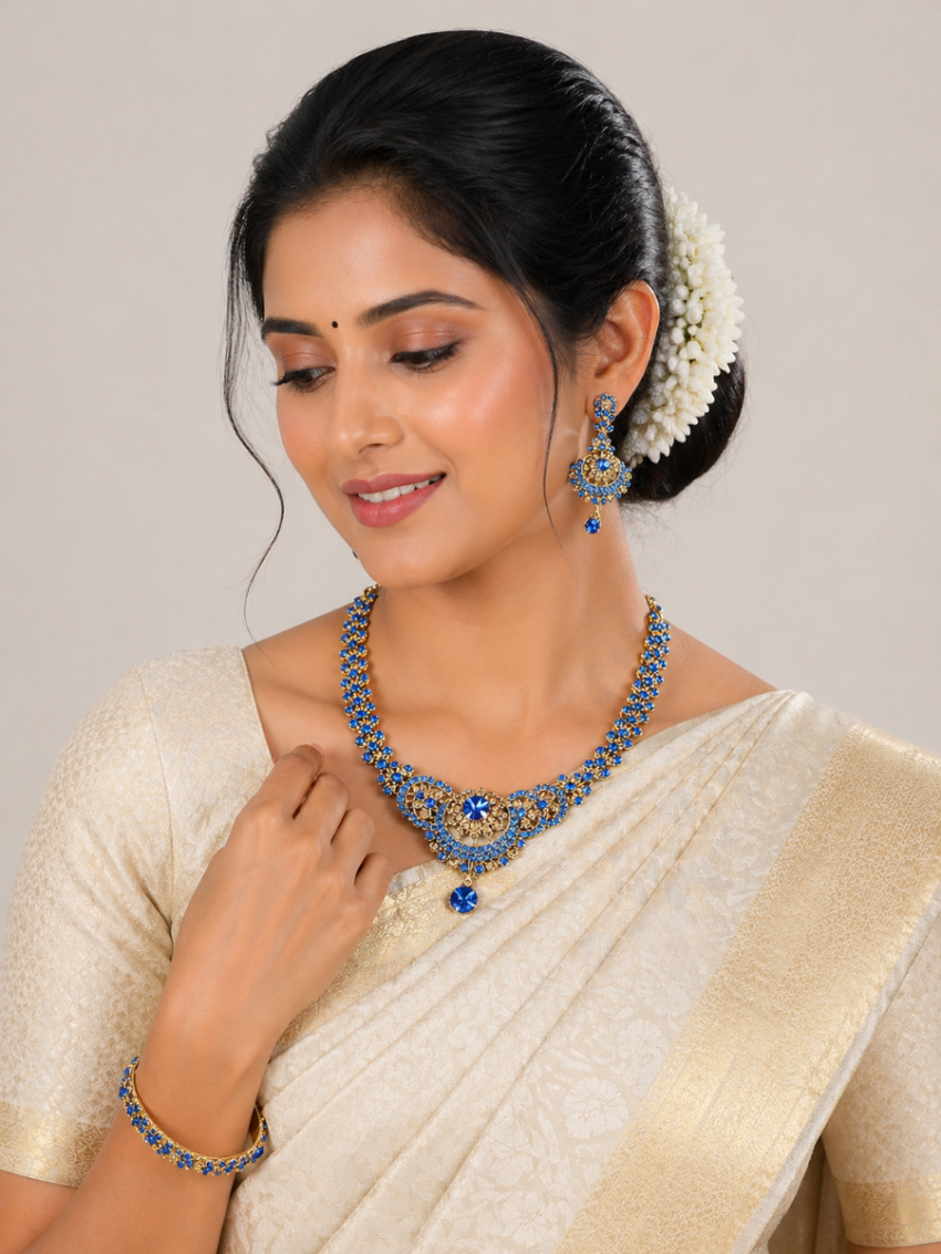 Neckalace and earring with blue stones.