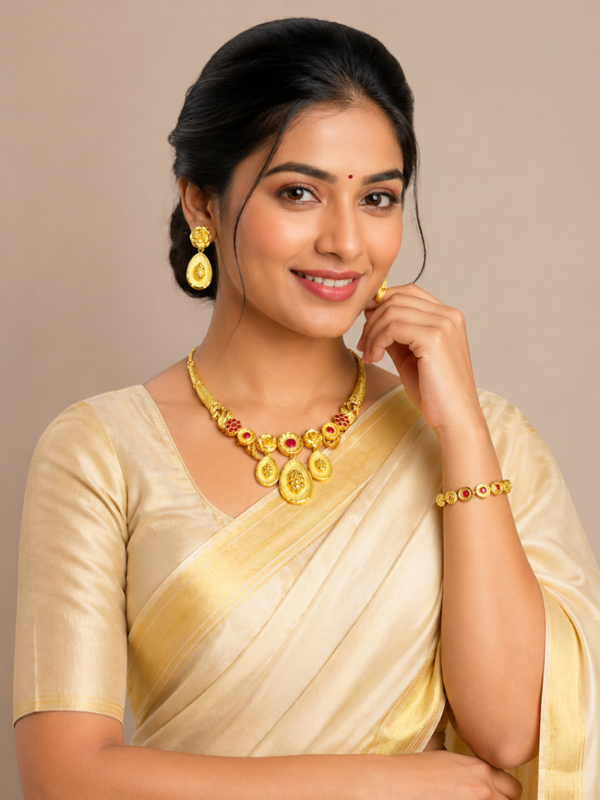 Gold plated necklace with red stone with earring