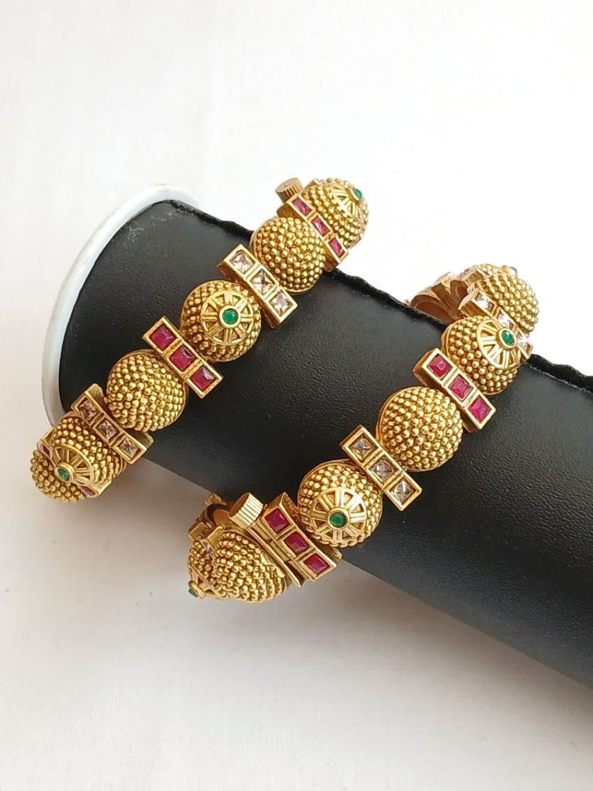 Designer Bangle with pink,Green and white zircon stones