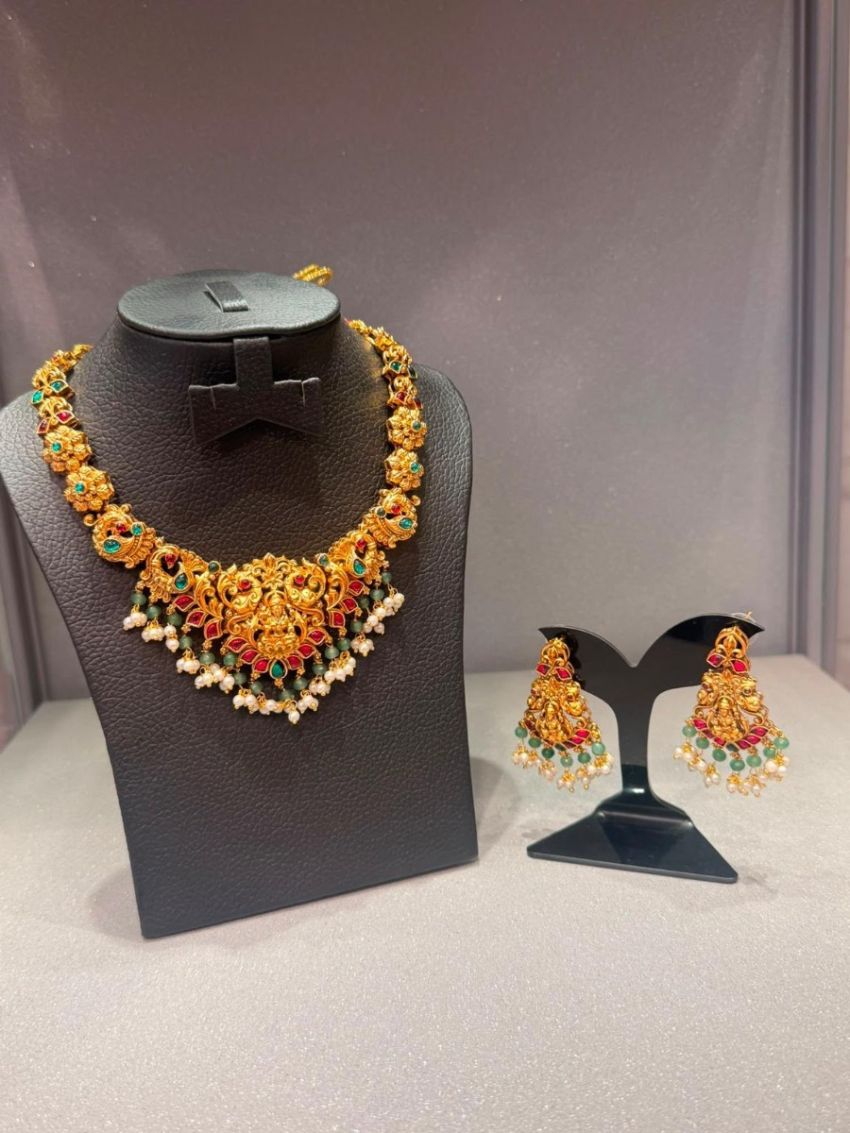 Antique gold temple necklace with ruby & emerald-tone stones, pearl drops, and matching earrings