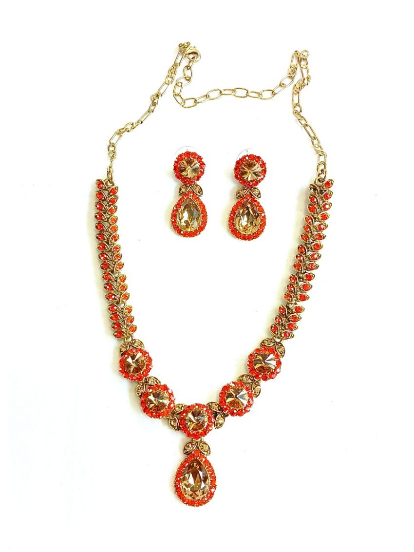 Neckalce and earring with red color stones