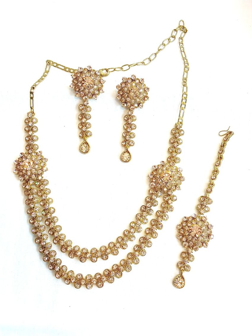 Neckalace and earring with gold color stones