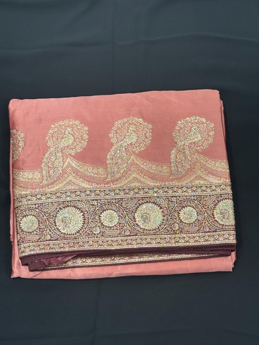 Elegant Dusty Rose Silk Saree with Intricate Zari Border